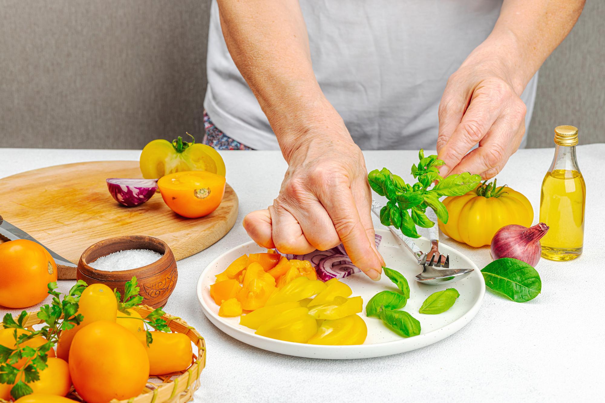 Chef prepares a seasonal dish in a local kitchen